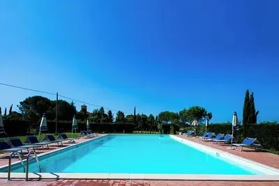 Image de Maison de vacances 'Podere Simonetta - A1' avec piscine partagée, terrasse privée et Wi-Fi