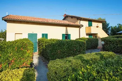 Image de Maison de vacances 'Podere Simonetta - A7' avec piscine partagée, terrasse privée et Wi-Fi