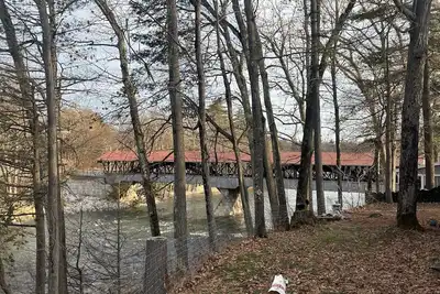 Image de Get away to where the rivers meet, between two covered bridges! .