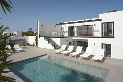 Image de Sunset Sights | Modern ocean-view 4-bedroom villa with heated pool.