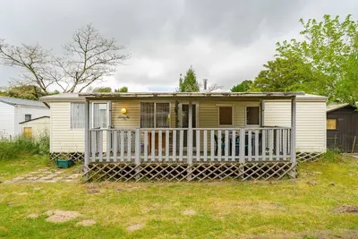 Image de Mobile Home 'Mobilhome Mh287 La Tremblade' avec piscine partagée, terrasse privée et climatisation
