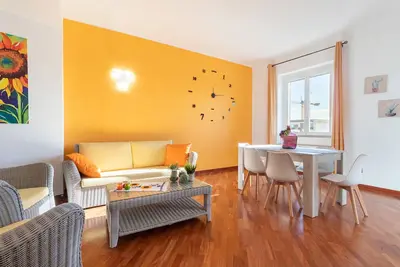 Image de Appartement 'Sole E Girasoli' avec balcon et climatisation