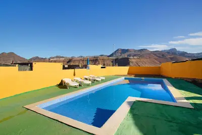 Image de Maison de vacances 'Villa Paraiso Aldeano 1+2' avec vue montagne, piscine privée et Wi-Fi