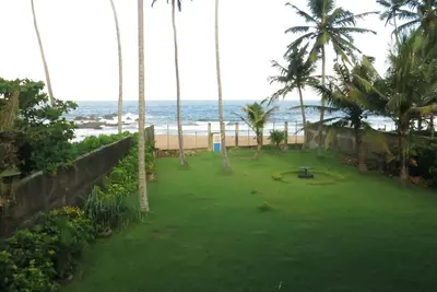Image de Champtil Ambalangoda, Large house with garden next to the beach and sea.