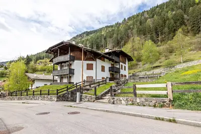 Image de Appartement 'Collini Le Betulle' avec vue sur les montagnes, jardin privé et balcon