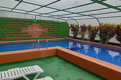 Image de Acogedora suite La Carolina sobre la Republica del Salvador, con piscina.