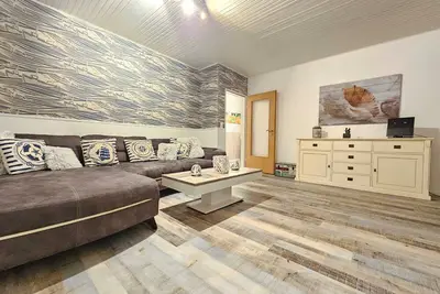Image de Herzlich Willkommmen in der Ferienwohnung Huus Merle Unnern!