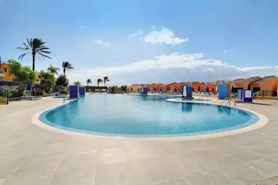Appartement de vacances 'Meloneras 1' avec piscine partagée, Wi-Fi et climatisation