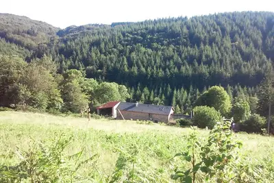Image de Maison De Campagne au bord de la rivière à 10 minutes des lacs.