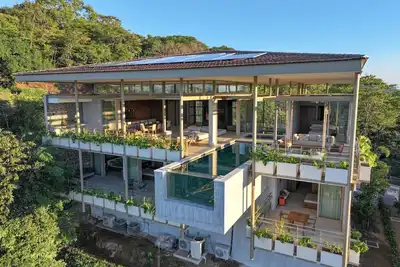 Image de Eco Villa with Stunning Ocean View, Private Pool, Golf Cart & Full Staff!