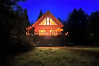 Image de Ride right from this trailside cozy cabin in the woods with private pond.