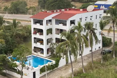 Image de Condo with pool near the beach