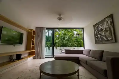 Image de Condo located in the center of everything in Pdc with pool, gym, bar, spa.