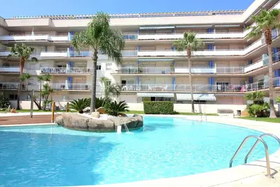 Image de Port CANIGÓ Ii 304 -Apartamento agradable y luminoso con vistas al canal y piscina, en Santa Margarita (Roses)