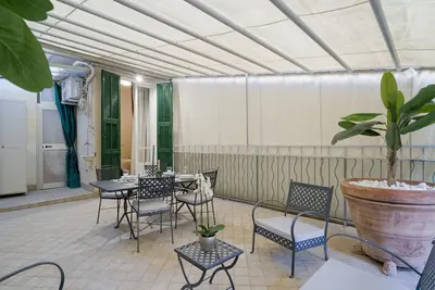 Image de Charming apartment perfect for 3 guests is located in an exclusive and central position, in a stepped pedestrian street in the historic center (typical Ligurian caruggio) near the Casino. The house is equipped with all the comforts to make your stay un