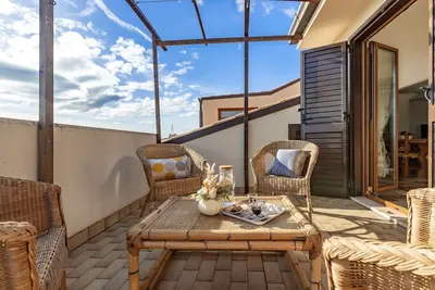 Image de Joli appartement avec Wifi, bain à remous, climatisation, Tv, terrasse, vue panoramique et parking