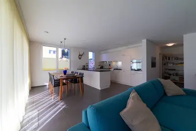 Image de Rietgarten - appartement de jardin de 4. 5 chambres avec une vue magnifique