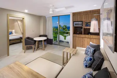 Suite with whirlpool and balcony at Grand Sirenis on the Riviera Maya