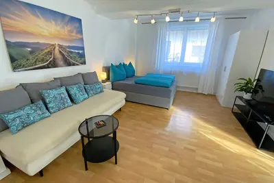 Image de Modernes Apartment in Ruhiger und Zentrale Lage - Perfekt fĂĽr Familien & Gruppen
