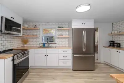 Image de New listing! Cozy cottage, walking distance to beautiful Torch Lake and Alden.