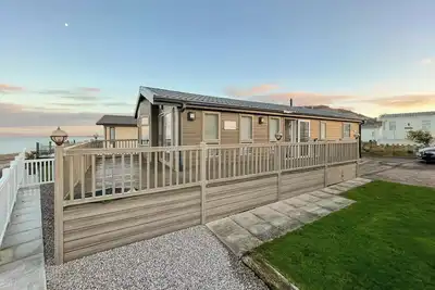 Image de Sea views don’t come much better than Sunset Lodge.