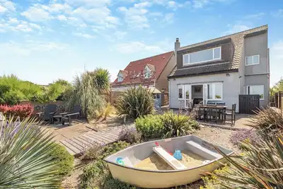 Image de 4 chambres à coucher à Winterton-on-Sea