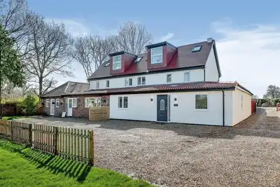 Image de Orchard Farm Cottage 1\nRelax with the whole family at this peaceful, cosy heaven