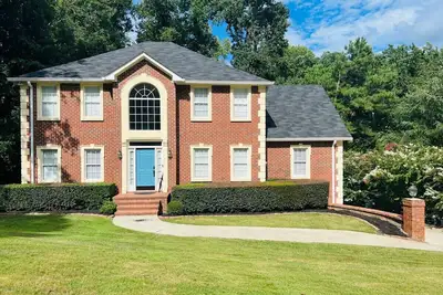 Image de Spacious Retreat 5b/2. 5b with 4 King beds  & Ev Charger