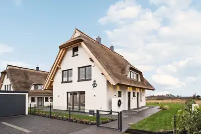 Image de Luxuriöse Ferienwohnung - mit Wohlfühlausstattung Inkl. Wellnessbereich & Kamin