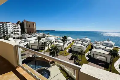 Image de Condo on Sandy Beach at Las Palmas Resort G-404