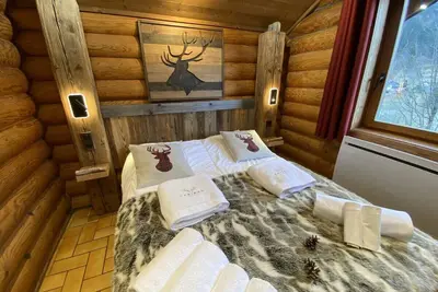 Image de Le Grand Cerf  Chalet en rondins avec Spa Jacuzzi