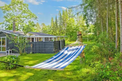 Image de Maison de vacances pour 4 a Glesborg-By Traum