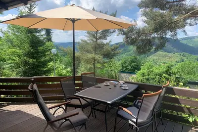 Image de Bungalow avec vue près de Coo