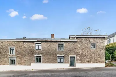 Image de Maison de vacances caractéristique avec balcon