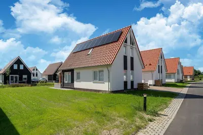 Image de Maison de vacances à Scherpenisse avec jardin