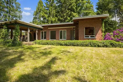 Image de Chalet très confortable avec un immense jardin, situé au calme dans le vert Arendonk