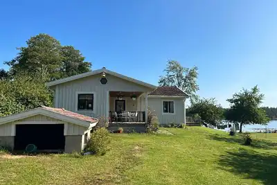Image de Wonderful holiday home location right on the lake in SmĂĄland