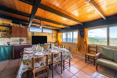 Image de Maison de vacances \"Is Zuddas\" avec vue sur la mer et terrasse privée