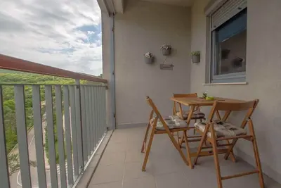 Appartement de vacances avec vue mer partielle