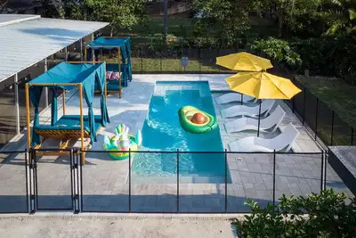 Dive into Delight: Pool, Cabanas, Grill, Game Room
