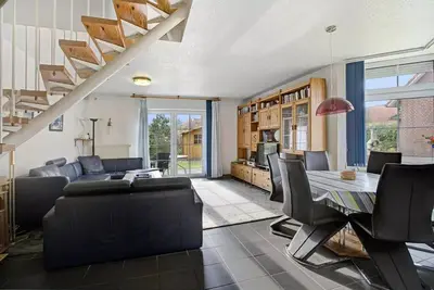 Image de The vacation home Schöne Lizzy is located in Neßmersiel and is the ideal accommodation for a relaxing vacation.