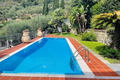 Image de Villa Le Anfore pool and park with sea view