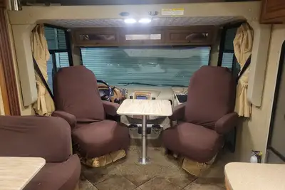 Image de Class A motorhome. In our backyard or a local Rv resort.