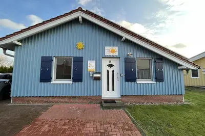 Image de 6 person wellness holiday home with sauna, whirlpool, two toilets and wood-burning stove in Otterndorf