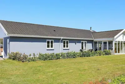 Image de Maison de vacances pour 8 a Skals-By Traum