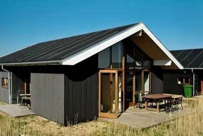 Image de Maison de vacances pour 8 a Ulfborg-By Traum