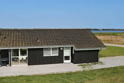 Image de Maison de vacances pour 8 a Storvorde-By Traum