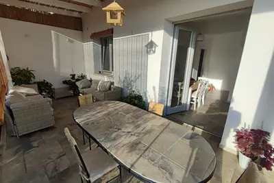 Image de Cozy cottage, comfortable veranda where you can spend pleasant evenings.