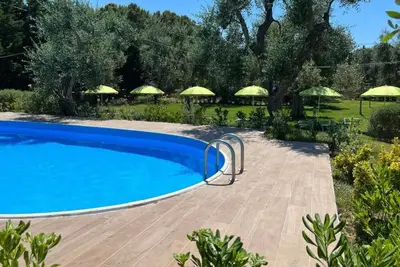 Image de Appartement 'Quadrupla - Villa Terra Nostra' avec piscine partagée, Wi-Fi et climatisation