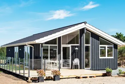 Image de Maison de vacances pour 8 a Glesborg-By Traum